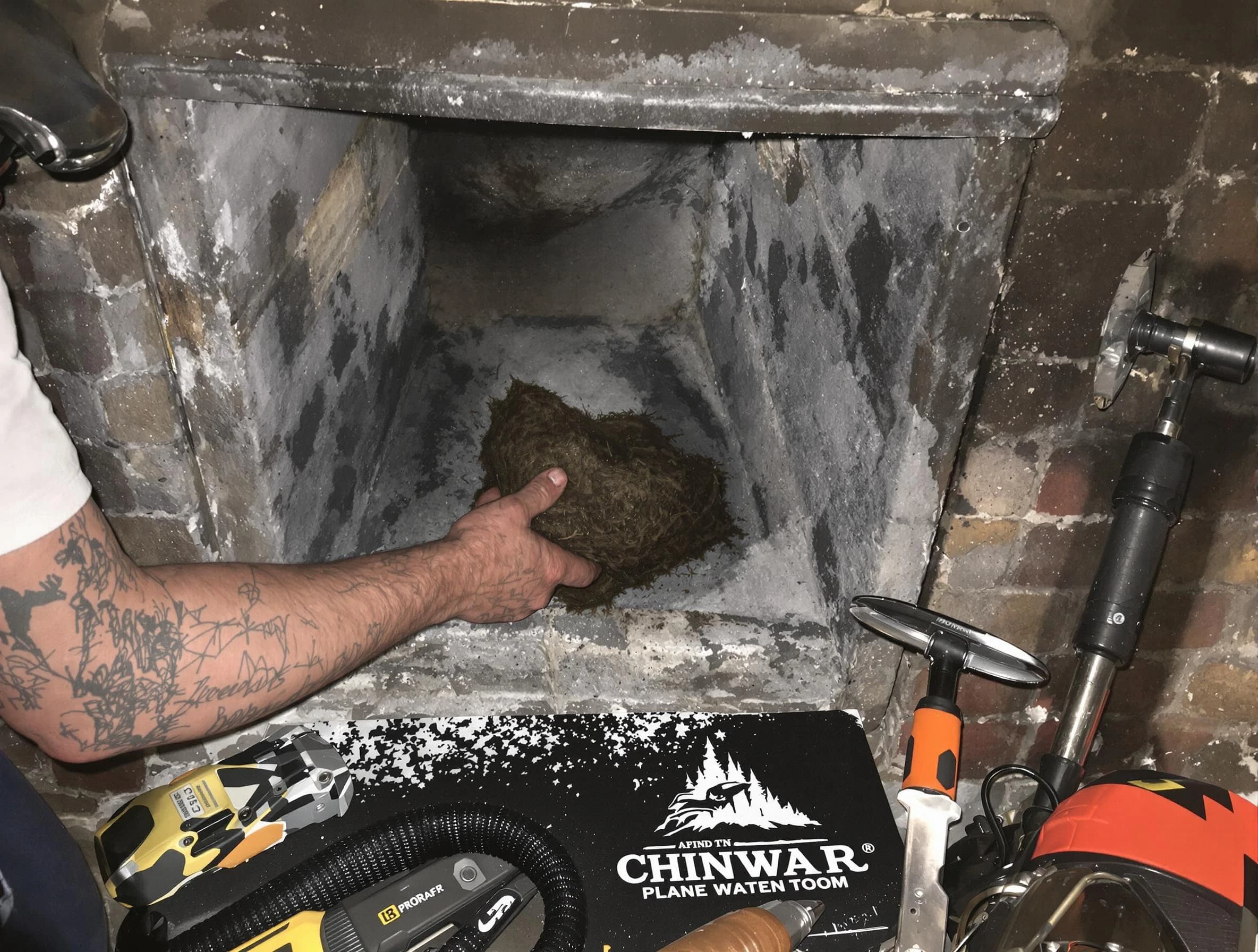 Snyderville Chimney Sweep safely removing debris and screening chimney in Snyderville, UT